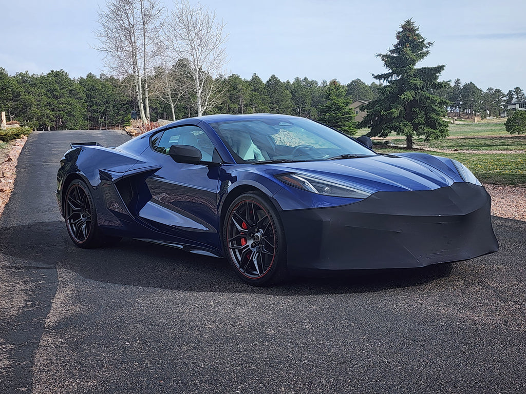 Blue C8 Corvette Z06 with the NoviStretch FBM850V front bumper mask fitted over the front fascia and splitter
