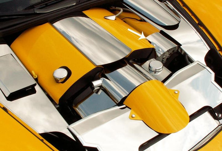 ACC 043033 polished alternator cover in a yellow-trim C6 engine bay