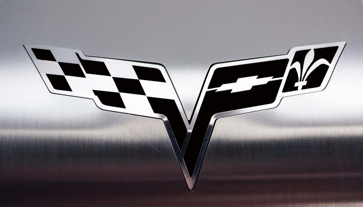 ACC 043122 Black Solid inlay detail on C6 Corvette crossed-flags alternator cover