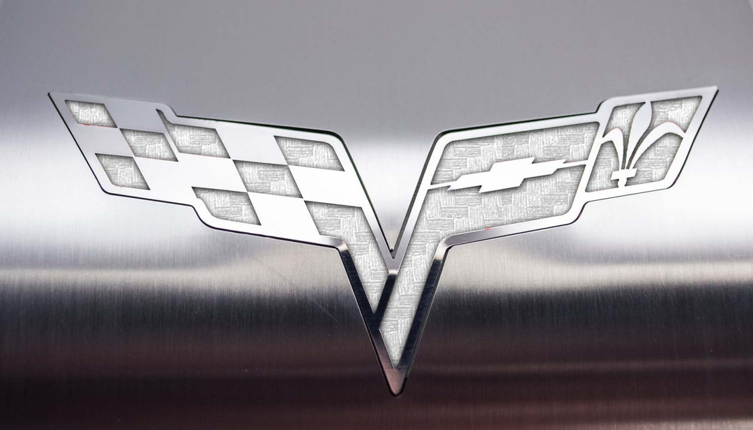 ACC 043122 White carbon-fiber-look vinyl inlay detail on C6 Corvette crossed-flags alternator cover