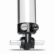 Close-up view of the QA1 Stocker-Star double-adjustable shock mounting eyelet and hardware for C5 Corvette suspension.
