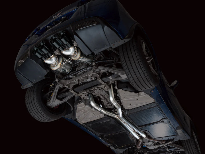 Underbody view of AWE Touring exhaust with Diamond Black tips on a C6 Corvette