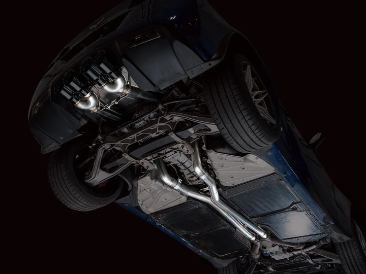 Underbody view of AWE Track exhaust with Diamond Black tips on a C6 Corvette