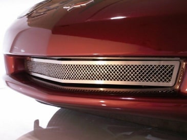 American Car Craft 042041 polished Laser Mesh grille in the C6 Corvette Base front opening, angled view