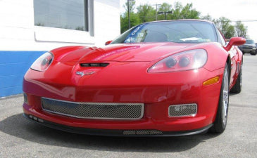 Angled front view of a red C6 Corvette with American Car Craft 042043 polished Laser Mesh main grille