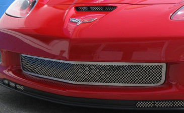 American Car Craft 042043 polished main grille in a red C6 Corvette front opening, close-up