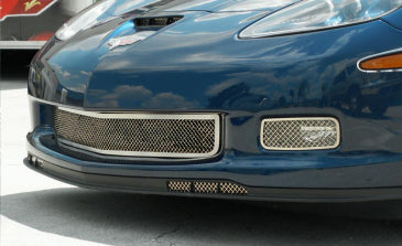 Lower air-dam location of American Car Craft 042045 on a blue C6 Corvette; main and driving-light grilles are separate