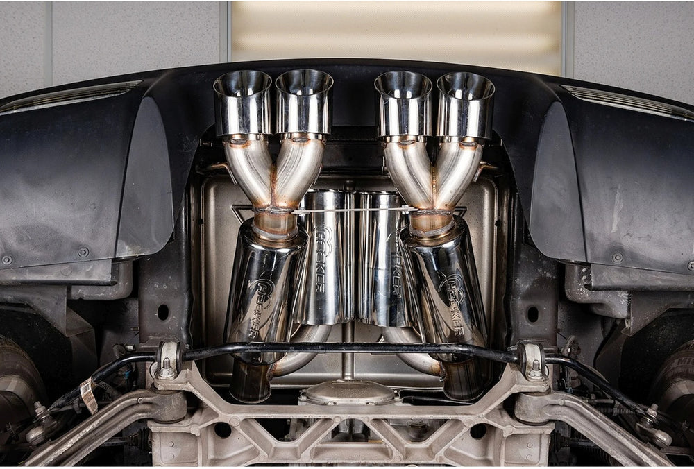 Alt text: Installed Hooker BlackHeart 70401312-RHKR axle back exhaust on 2005-2007 C6 Corvette LS2