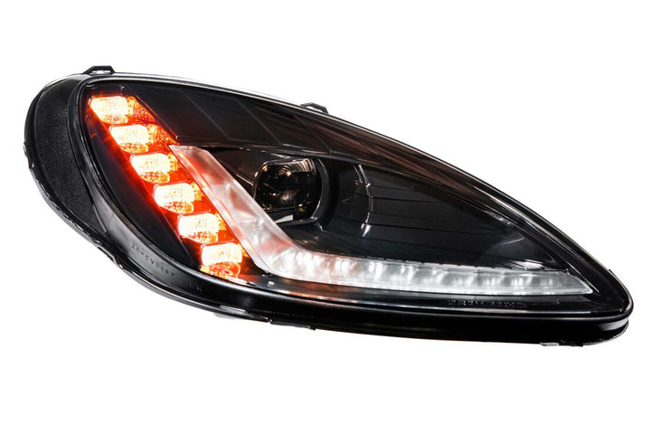 Morimoto XB Gen I C6 Corvette headlight with amber sequential turn signal illuminated