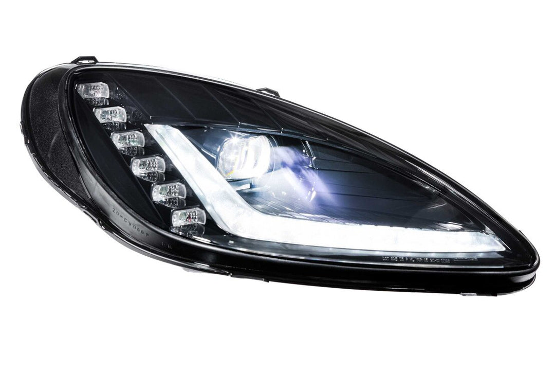 Morimoto XB Gen I C6 Corvette headlight with Bi-LED projector and white daytime running light illuminated