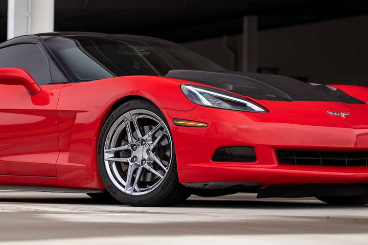 Morimoto XB LED front side markers installed on a 2005-2013 C6 Corvette three-quarter front view