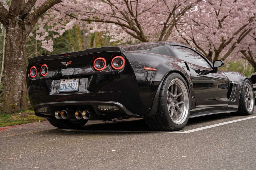 Morimoto XB LED rear side markers installed on a 2005-2013 C6 Corvette three-quarter rear view
