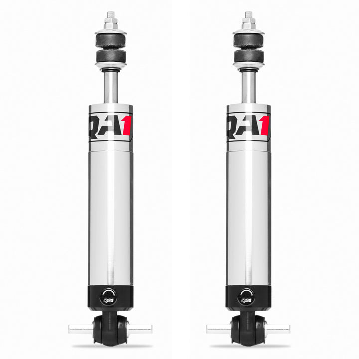 Pair of QA1 Stocker-Star single-adjustable front shocks for 2005–2013 C6 Corvette shown as complete replacement units.