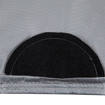 Close-up of protective felt backing behind a grommet on Covercraft Reflec’tect fabric