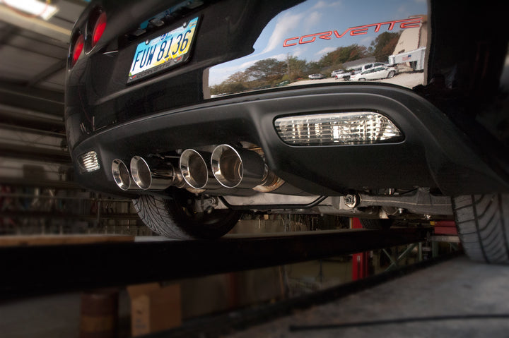 Stainless Works quad-tip axle-back installed rear view on a 2011 C6 Corvette Grand Sport LS3