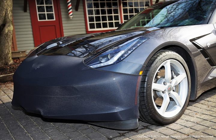 Close view of the NoviStretch FBM750V mask edge along the front fender of a grey C7 Corvette Stingray, showing how the mesh follows the fascia