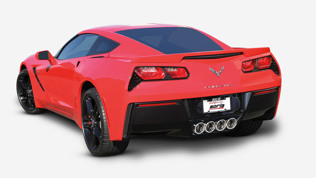Rear three-quarter view showing quad center-exit tips on Borla ATAK 11875 for C7 Stingray with NPP