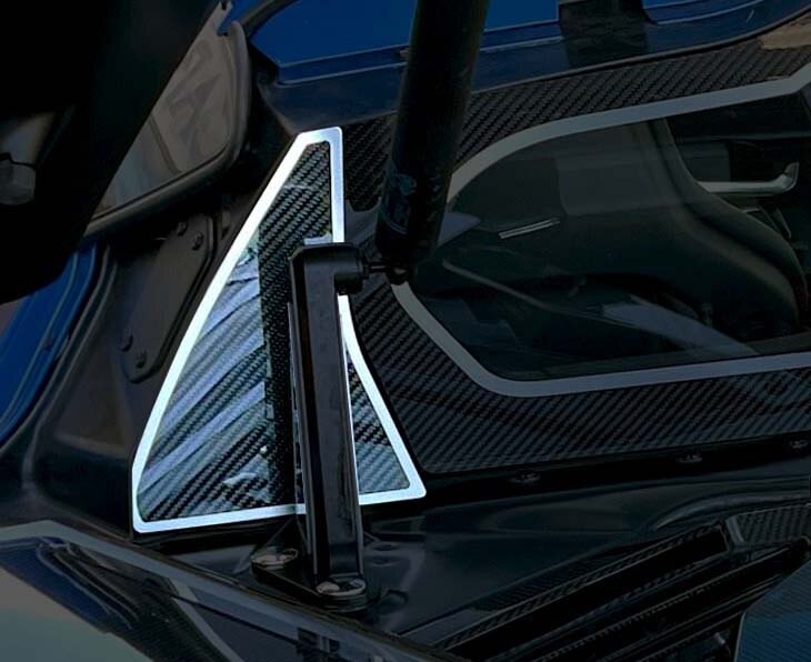 C8 Corvette carbon-pattern rear window accent with brushed trim; surrounding frame not included.