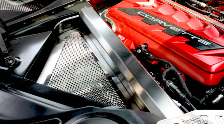 American Car Craft C8 Corvette perforated header guard kit installed with a brushed rear crossmember cover