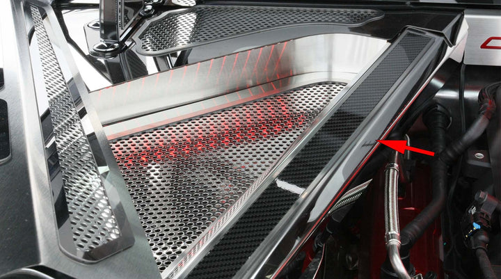 Real carbon-fiber top on ACC 883027 rear crossmember cover with polished stainless trim in a C8 Corvette Coupe engine bay