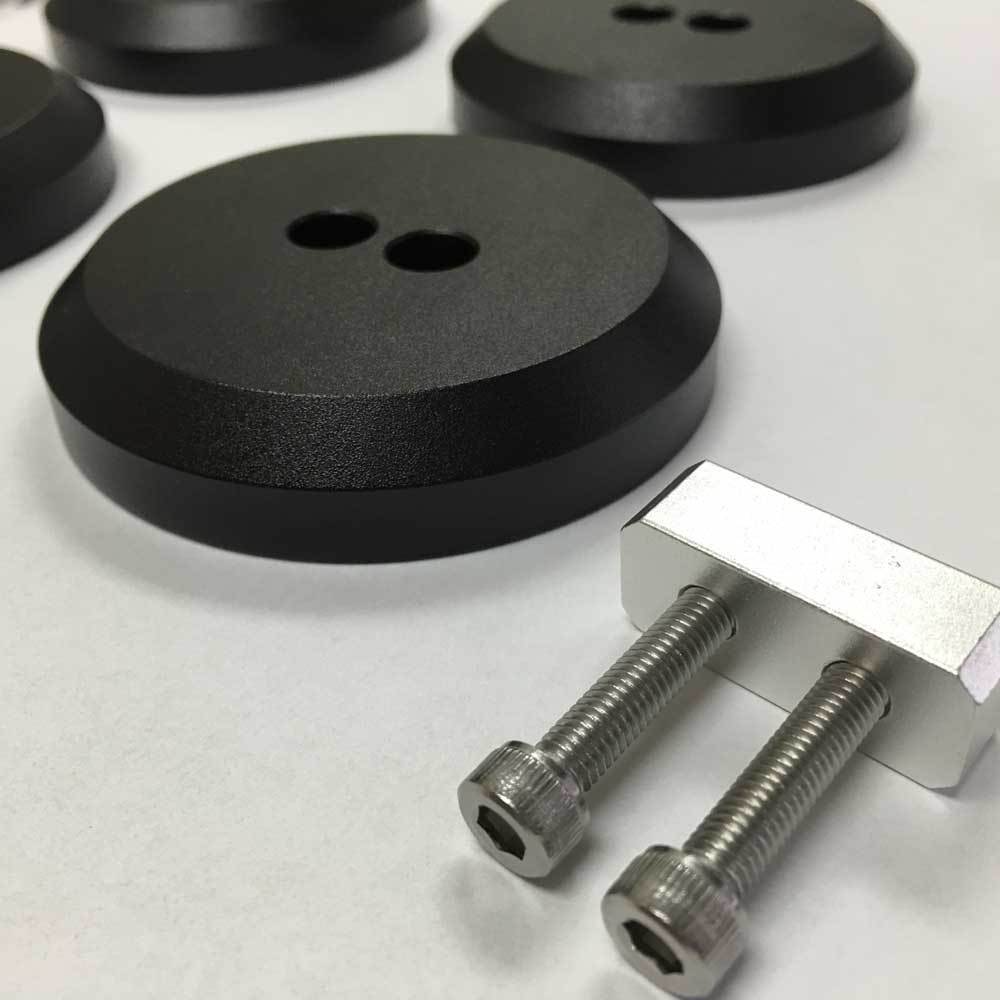Black anodized ACS Composite jacking pucks, part 45-4-195 for the C8 Corvette E-Ray