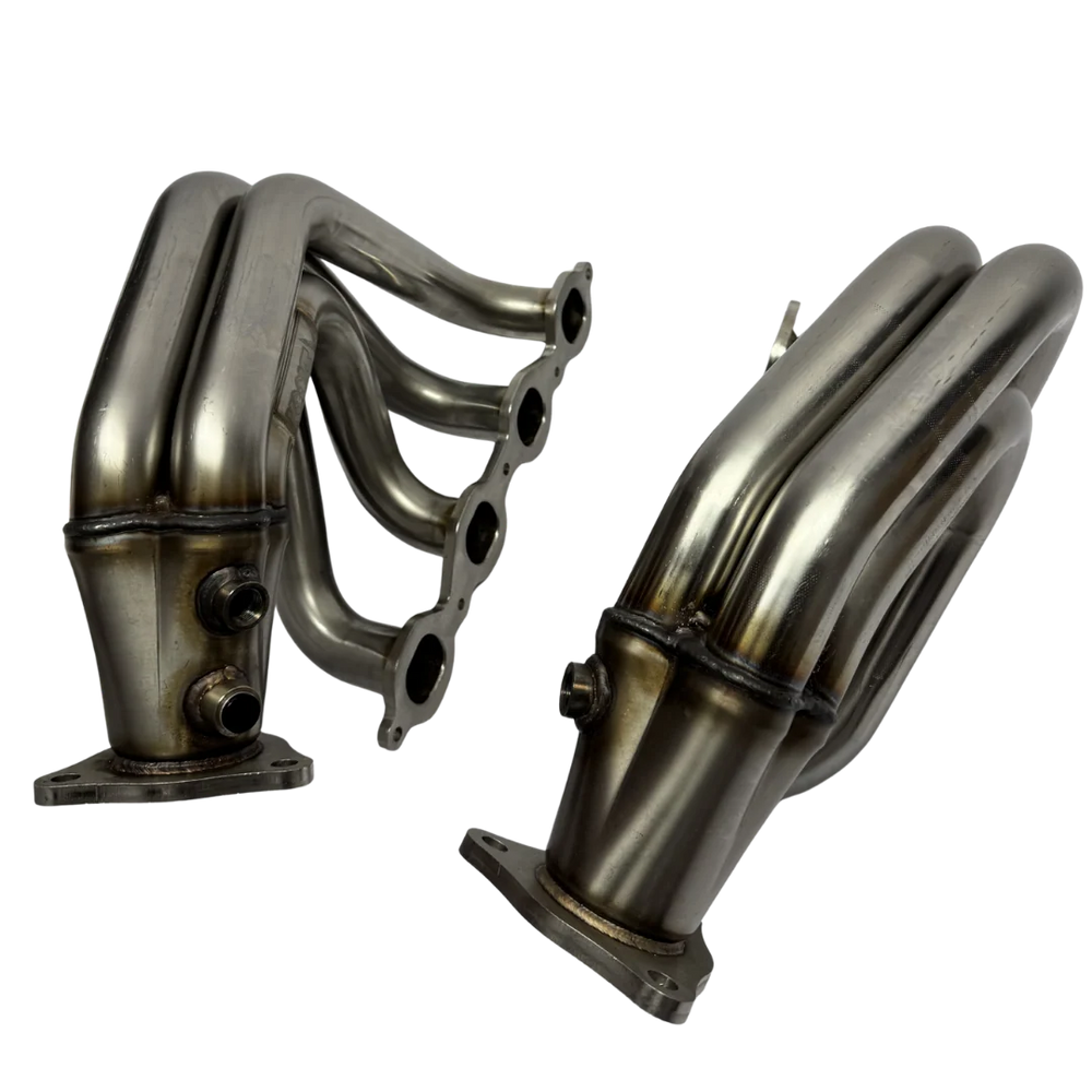 Kooks 1-7/8 inch C8 Corvette E-Ray headers from a lower angle showing the collector on one unit and the primaries on the other