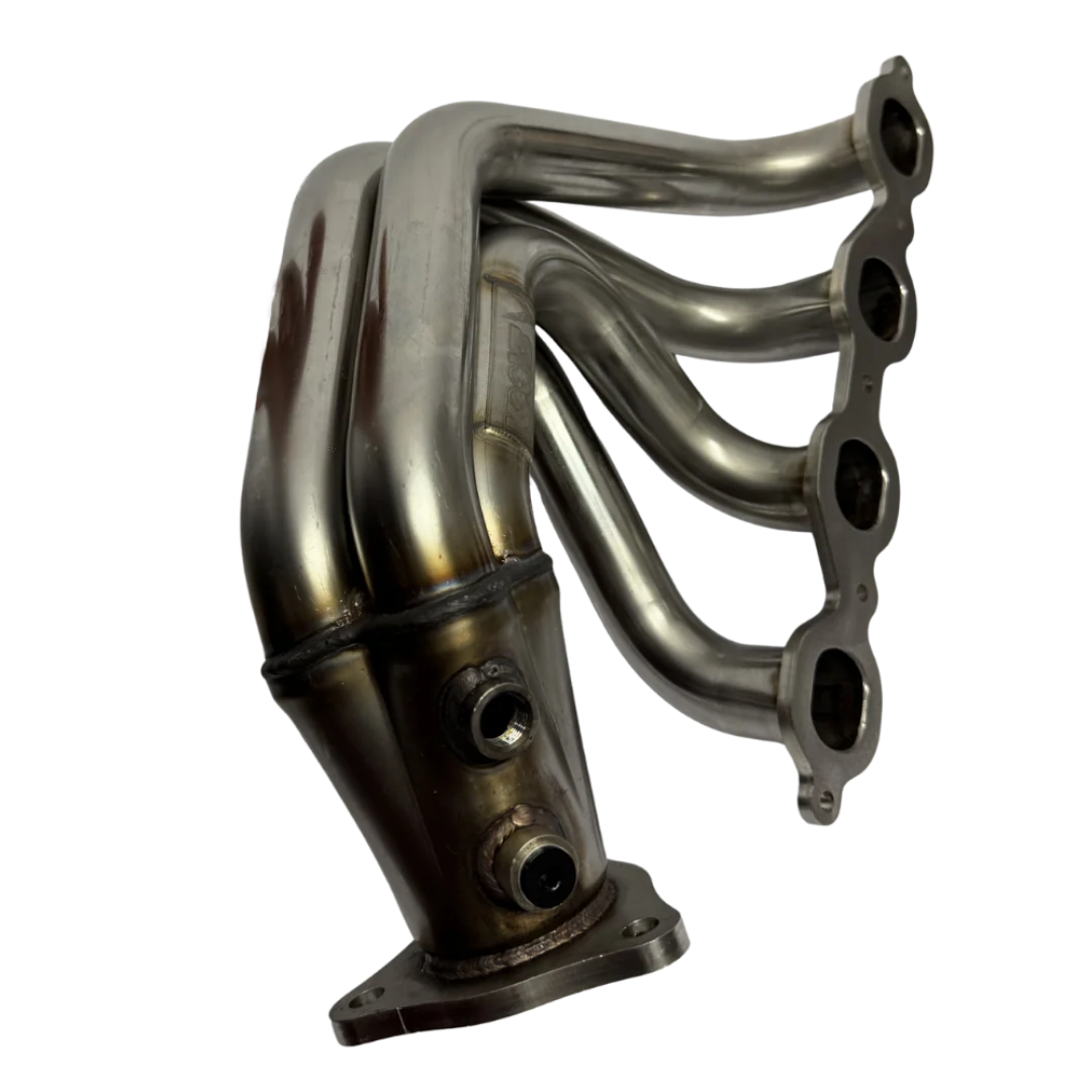 Close view of the two EGT sensor bungs on the collector of a Kooks C8 Corvette E-Ray header