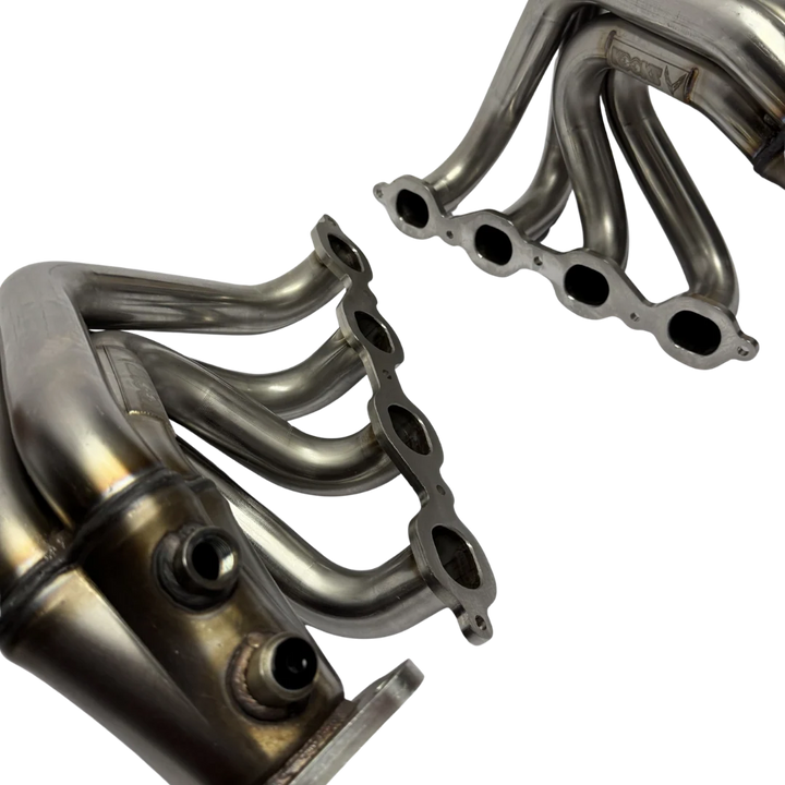 Oval port head flanges on a pair of Kooks C8 Corvette E-Ray long tube headers, stock bolt pattern visible
