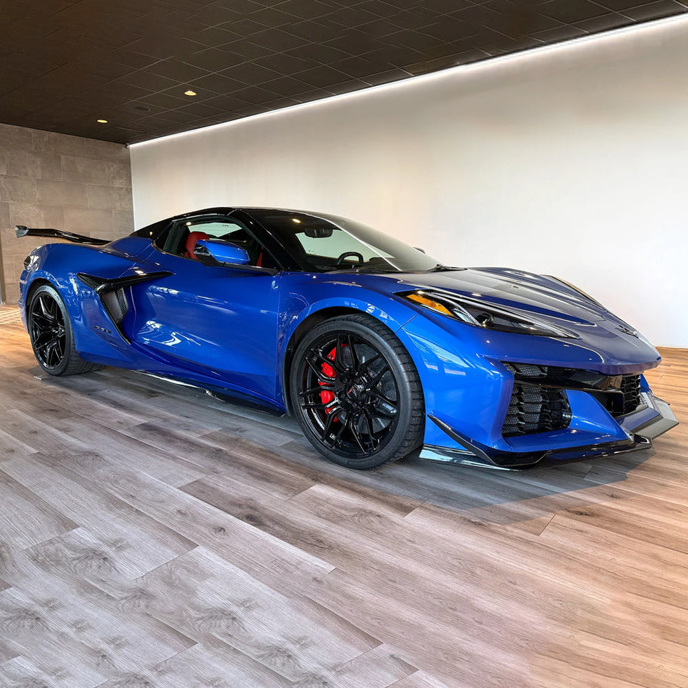 2024–2026 C8 Corvette E-Ray with ACS Composite side radiator guards installed, full car 3/4 view showing cooling vent protection.