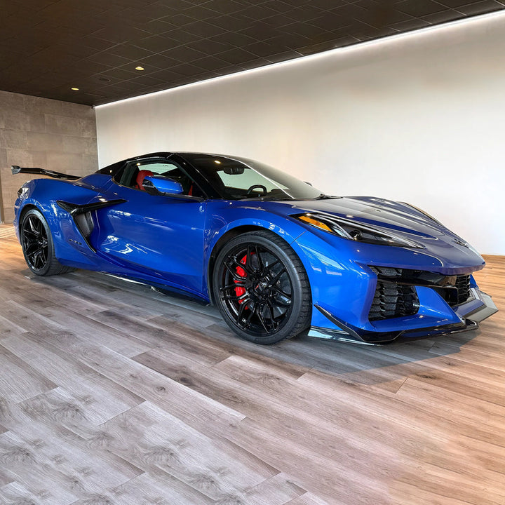2024–2026 C8 Corvette E-Ray with ACS Composite side radiator guards installed, full car 3/4 view showing cooling vent protection.
