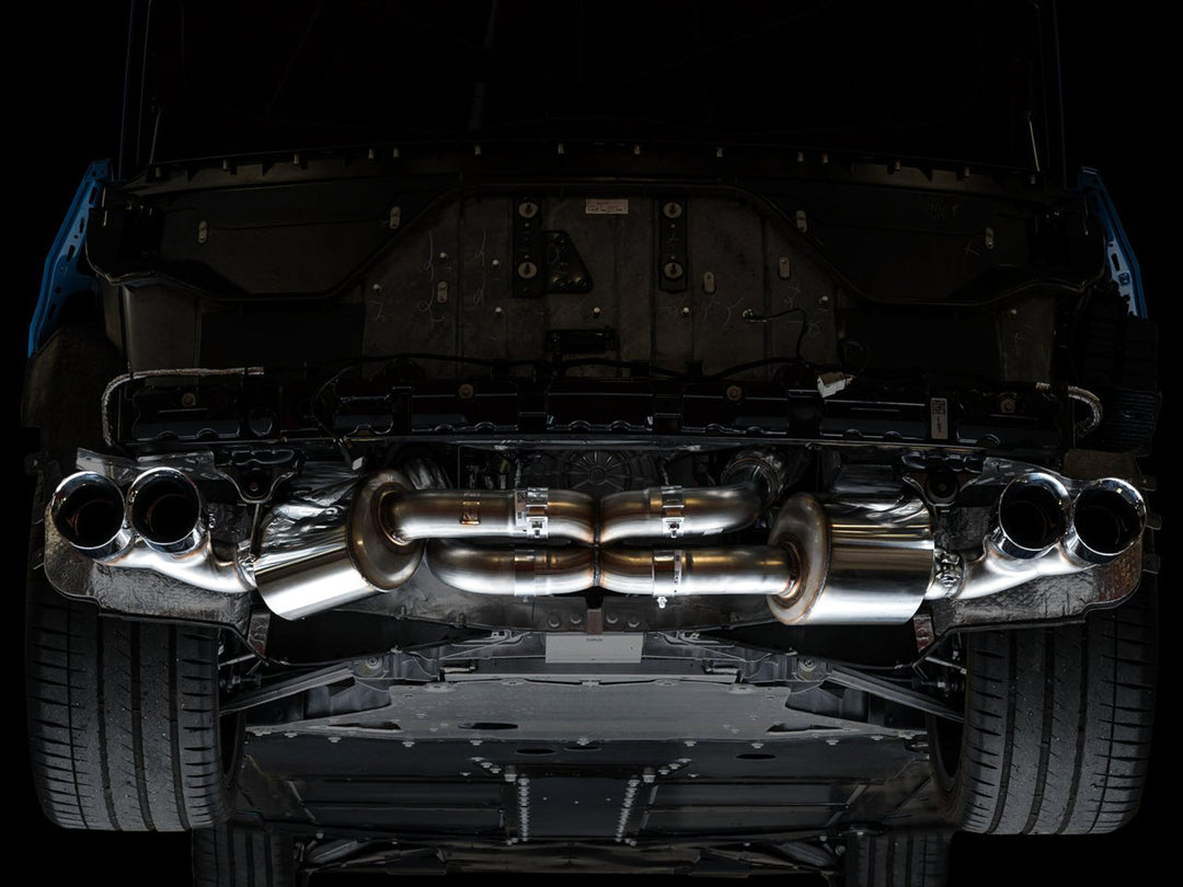 AWE 3015-42151 Touring exhaust with Chrome tips installed on a C8 Corvette, underbody view