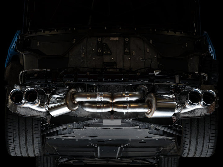 AWE 3015-42151 Touring exhaust with Chrome tips installed on a C8 Corvette, underbody view