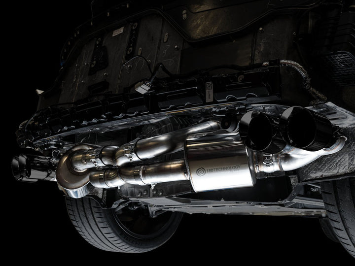 AWE 3015-43159 Touring exhaust with Diamond Black tips installed on a C8 Corvette, angled view
