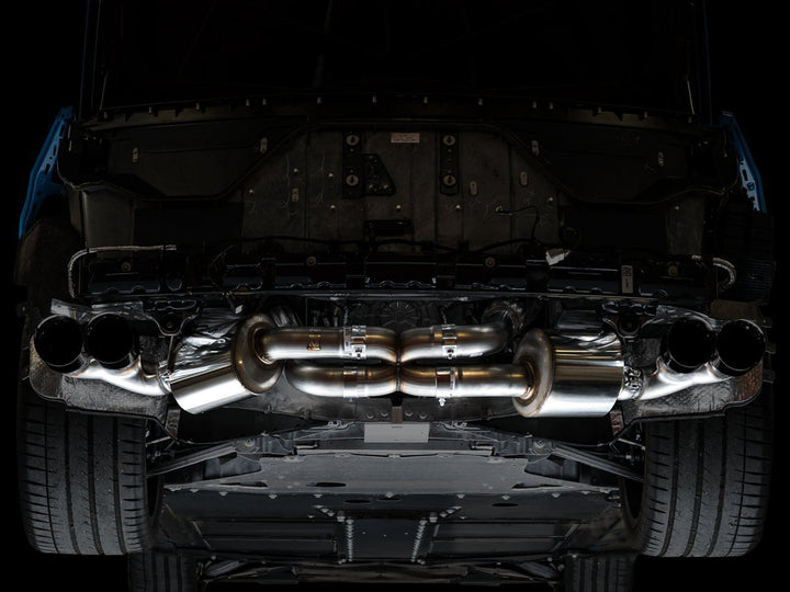 AWE 3015-43159 Touring exhaust with Diamond Black tips installed on a C8 Corvette, underbody view