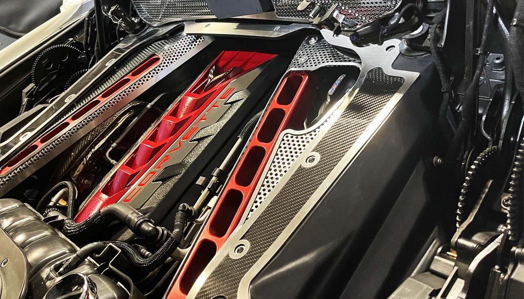 Angled view of perforated C8 convertible covers around exposed crossmembers
