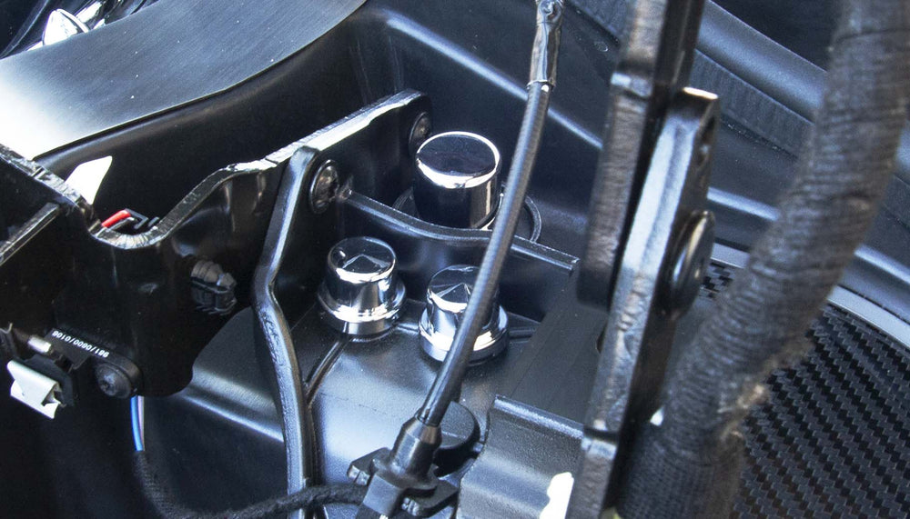 C8 Corvette HTC hinge fastener covers viewed beside the hinge support