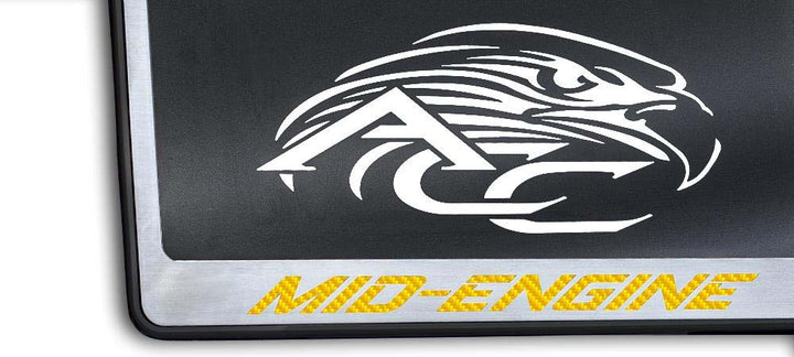 C8 Corvette MID-ENGINE license frame with yellow lettering and black-base trim