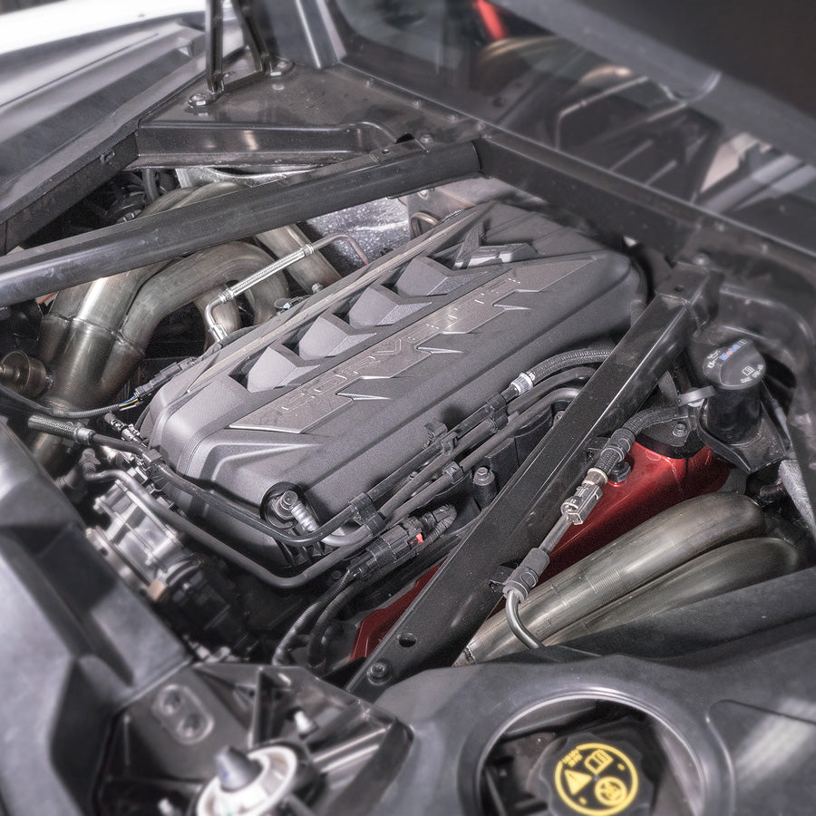 Stainless Works C8188H headers installed under a 2022 C8 Corvette Stingray showing long tube routing