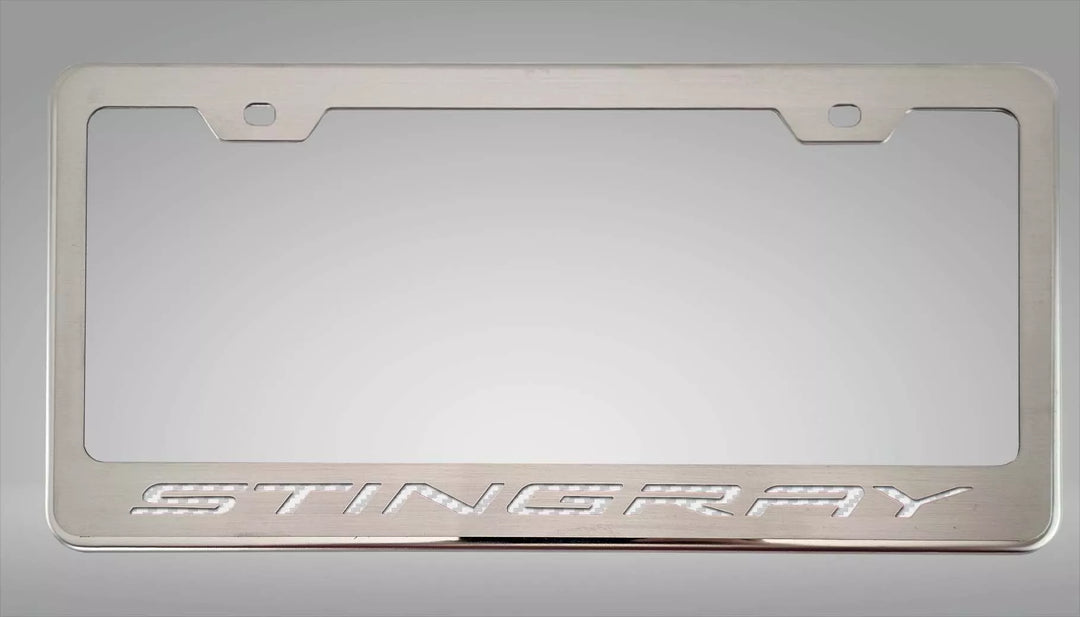 C8 Corvette STINGRAY license frame with white lettering and polished-base trim