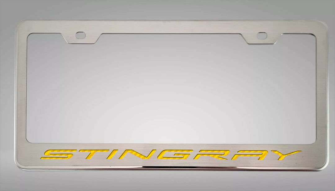 C8 Corvette STINGRAY license frame with yellow lettering and polished-base trim