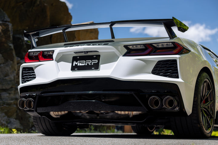 White C8 Corvette Stingray with MBRP Active Profile exhaust and quad carbon-fiber tips