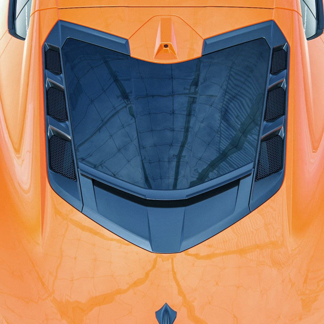 ACS Composite rear window spoiler on an orange narrow-body C8 Corvette, straight down on the rear glass and the window bezels