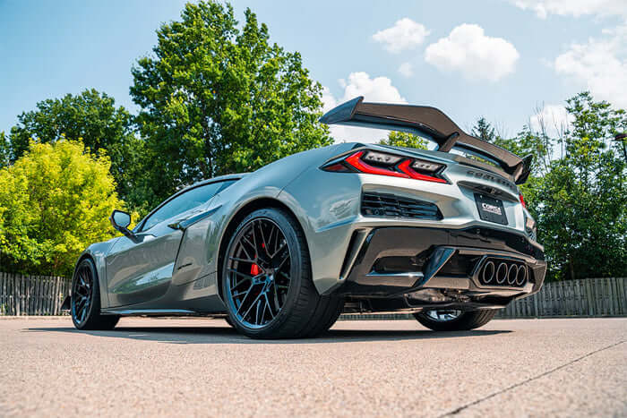 CORSA 21111 valved cat-back exhaust installed on a 2023–2026 C8 Corvette Z06 with factory bezels and an aggressive stance