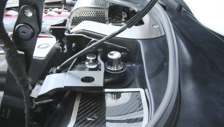 Chrome fastener covers on the C8 Corvette HTC hinge bracket