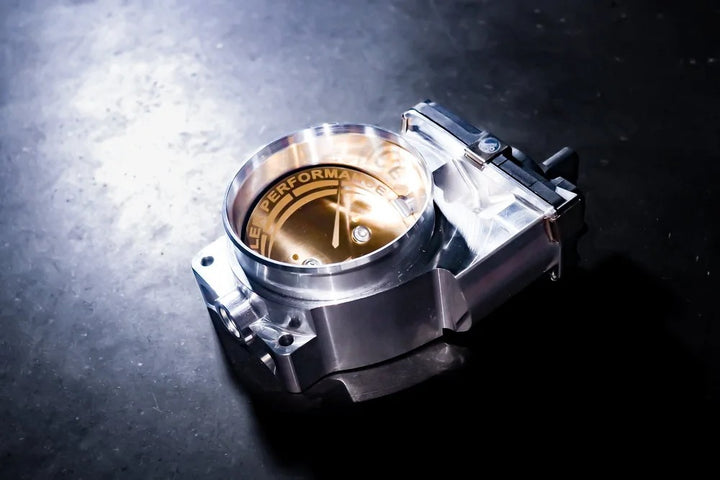 Close-up of Soler SE8223-92 true 92mm through-bore billet throttle body porting and inlet shaping