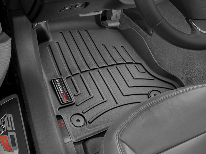 Black WeatherTech FloorLiner installed in the driver-side footwell of a 2005–2013 C6 Corvette.